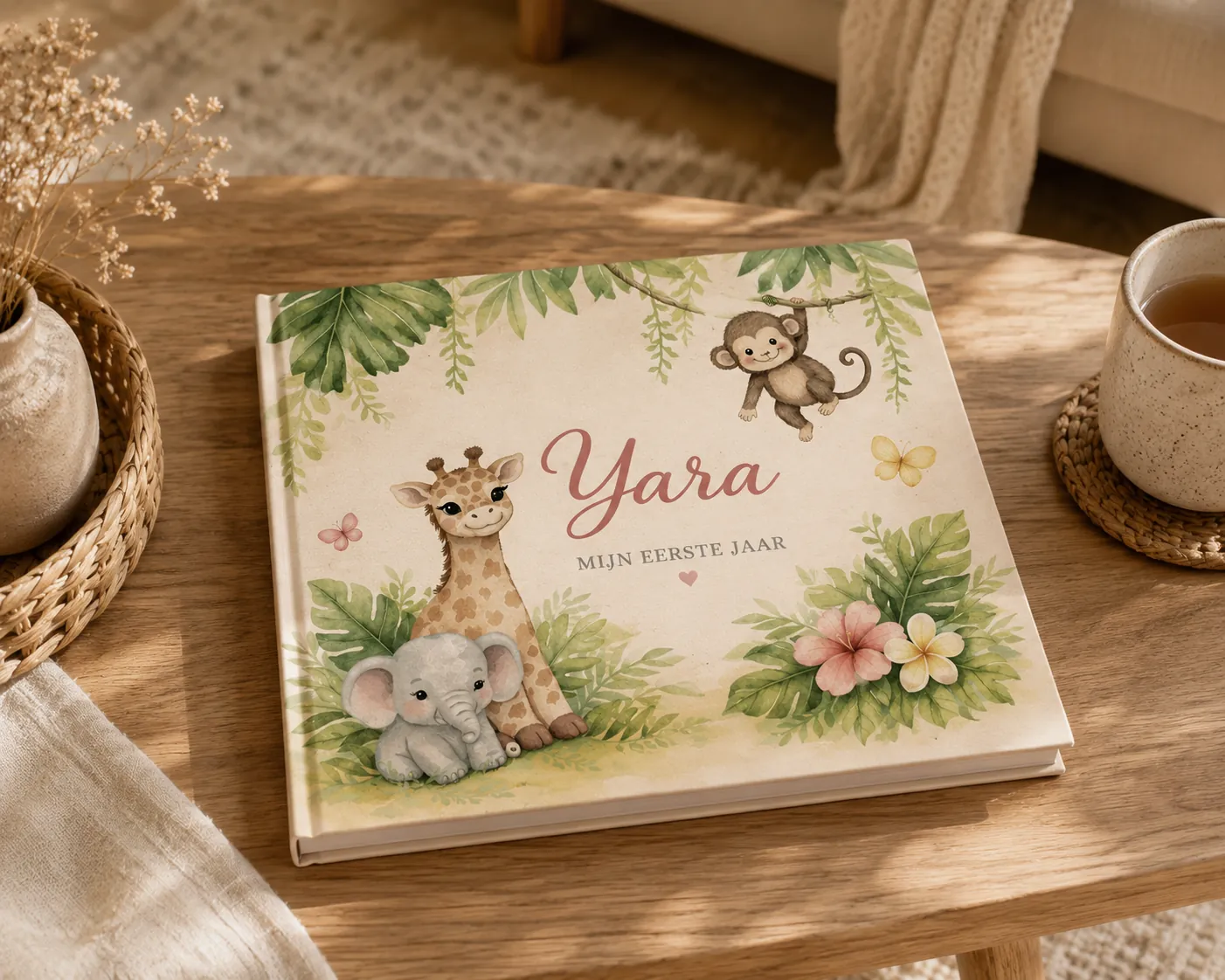 Photo book of Yara's first year in the style of her jungle birth announcement